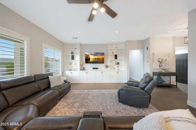 25454 N 73rd Ave, Peoria, AZ 85383 - living area featuring a ceiling fan, wood finished floors, built in features, baseboards, and visible vents