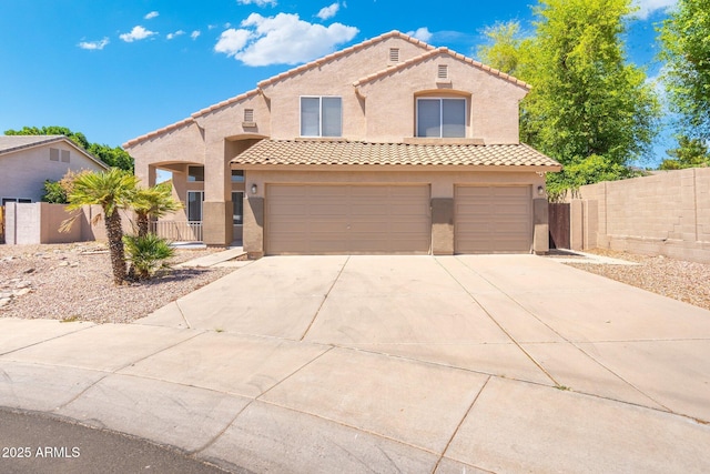 1254 W Browning Way, Chandler, AZ 85286 - mediterranean / spanish-style home with stucco siding, concrete driveway, a tiled roof, a garage, and fence