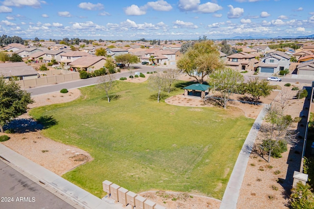 birds eye view of property with a residential view