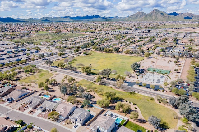 birds eye view of property featuring a mountain view and a residential view