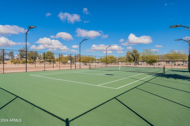 view of sport court featuring community basketball court and fence