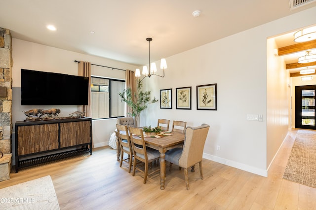 2582 S Cottonrose Ln, Flagstaff, AZ 86001 - dining room with light wood-style floors, a chandelier, baseboards, and recessed lighting