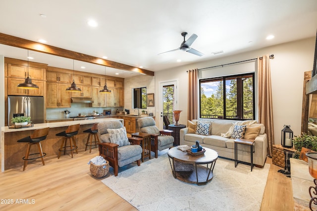 2582 S Cottonrose Ln, Flagstaff, AZ 86001 - living room featuring light wood finished floors, recessed lighting, beam ceiling, and a ceiling fan