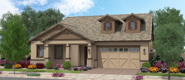 view of front of home featuring a porch and a garage