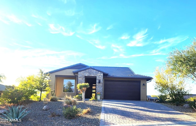 view of front of property with a garage