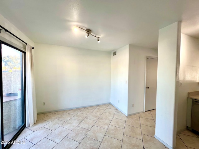 7801 N 44th Dr Unit 1180, Glendale, AZ 85301 - spare room with light tile patterned floors