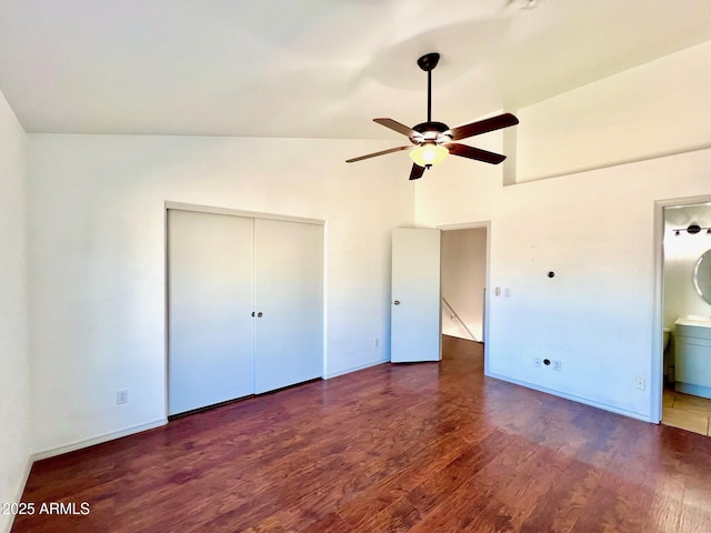 7801 N 44th Dr Unit 1180, Glendale, AZ 85301 - unfurnished bedroom with wood finished floors, a closet, high vaulted ceiling, connected bathroom, and ceiling fan