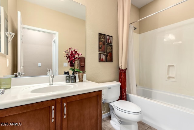 bathroom featuring shower / tub combo with curtain, toilet, vanity, and tile patterned floors
