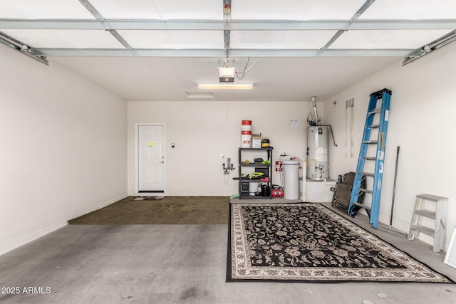 garage featuring water heater and a garage door opener