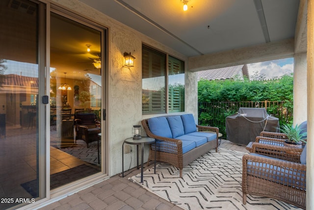 view of patio / terrace featuring an outdoor living space, visible vents, and area for grilling
