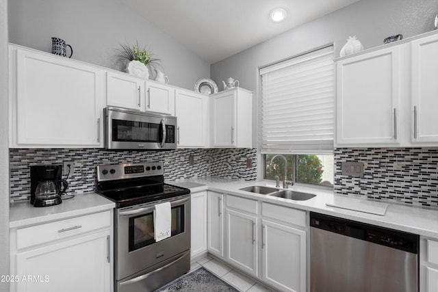 17611 W Ingleside Dr, Surprise, AZ 85374 - kitchen with white cabinetry, stainless steel appliances, light countertops, and a sink