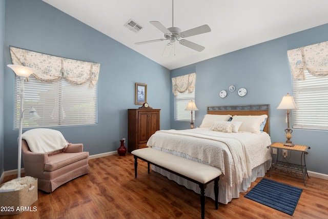 17611 W Ingleside Dr, Surprise, AZ 85374 - bedroom featuring wood finished floors, vaulted ceiling, baseboards, visible vents, and a ceiling fan