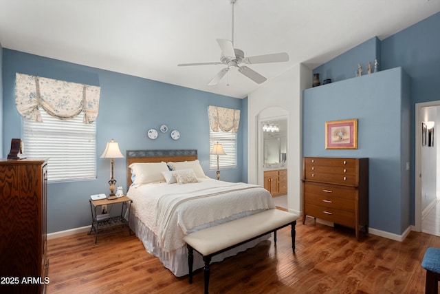 17611 W Ingleside Dr, Surprise, AZ 85374 - bedroom featuring baseboards, wood finished floors, ceiling fan, and vaulted ceiling