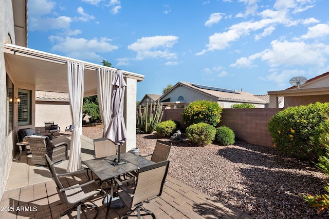 17611 W Ingleside Dr, Surprise, AZ 85374 - view of patio featuring outdoor dining area and a fenced backyard