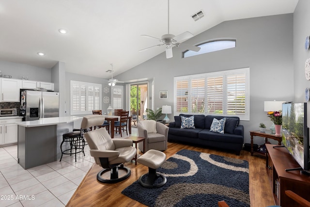 17611 W Ingleside Dr, Surprise, AZ 85374 - living area with a toaster, a ceiling fan, visible vents, and light wood-style floors