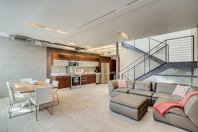 living room with light tile patterned floors