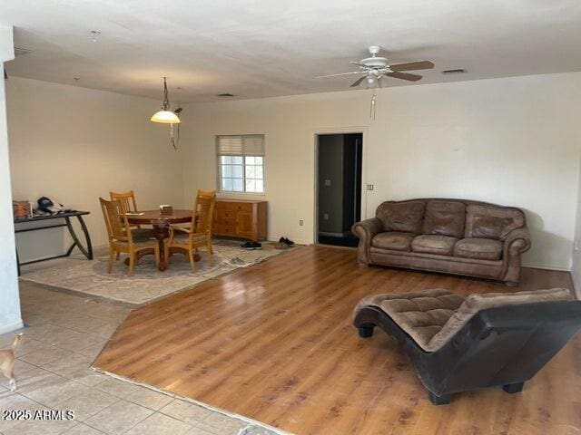 22744 E Carla Vista Dr, Mesa, AZ 85212 - living area featuring a ceiling fan