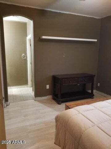 22744 E Carla Vista Dr, Mesa, AZ 85212 - bedroom featuring baseboards and arched walkways