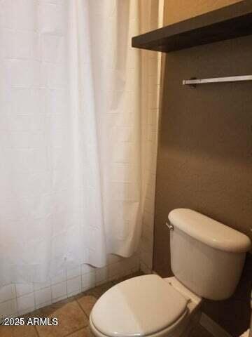 22744 E Carla Vista Dr, Mesa, AZ 85212 - full bath featuring toilet, tile patterned flooring, and curtained shower