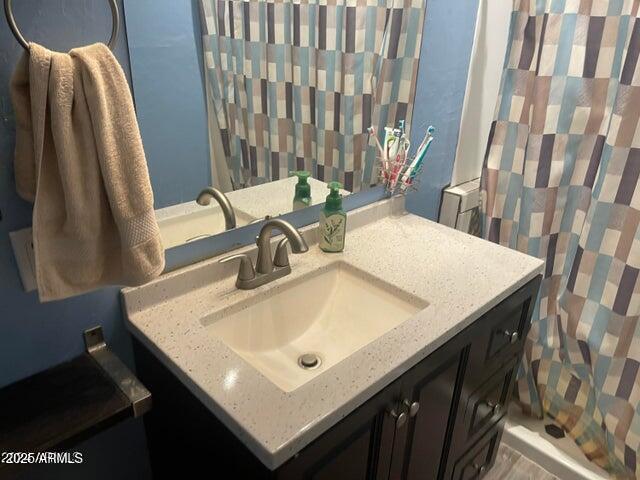 22744 E Carla Vista Dr, Mesa, AZ 85212 - bathroom with a shower with curtain and vanity
