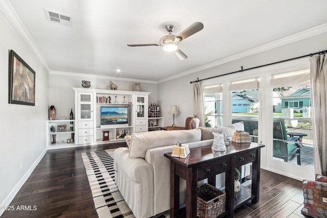 living room featuring ceiling fan, dark hardwood / wood-style flooring, and ornamental molding