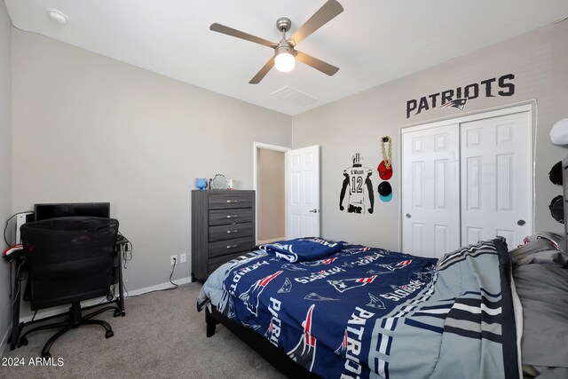 bedroom with ceiling fan, a closet, and carpet