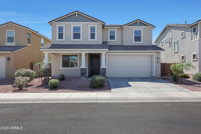 view of front of property with a garage