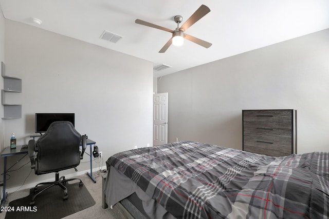 bedroom featuring light colored carpet and ceiling fan