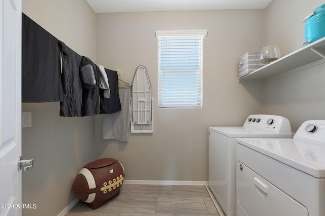 washroom featuring washing machine and dryer