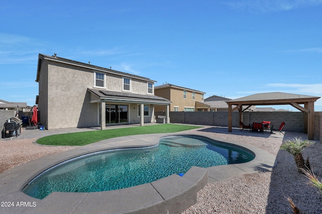 view of pool with a gazebo and a patio