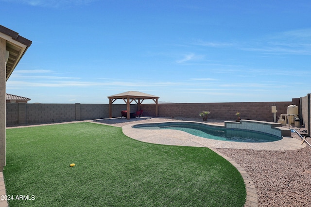 view of pool with a gazebo, a yard, and a patio area