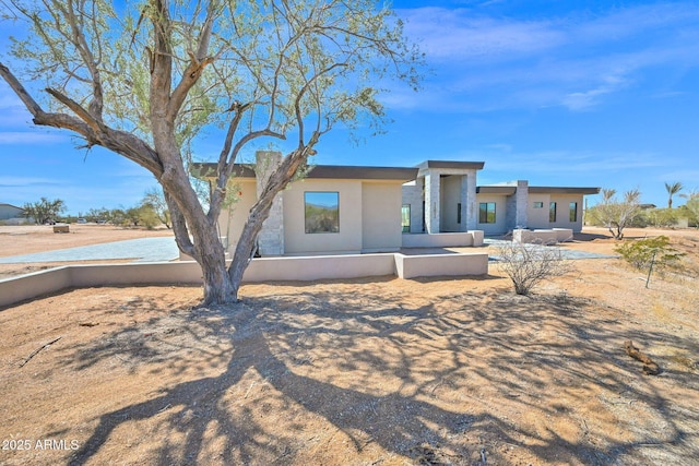 view of front of home with stucco siding