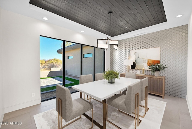 dining room featuring wallpapered walls, baseboards, wood ceiling, a tray ceiling, and recessed lighting