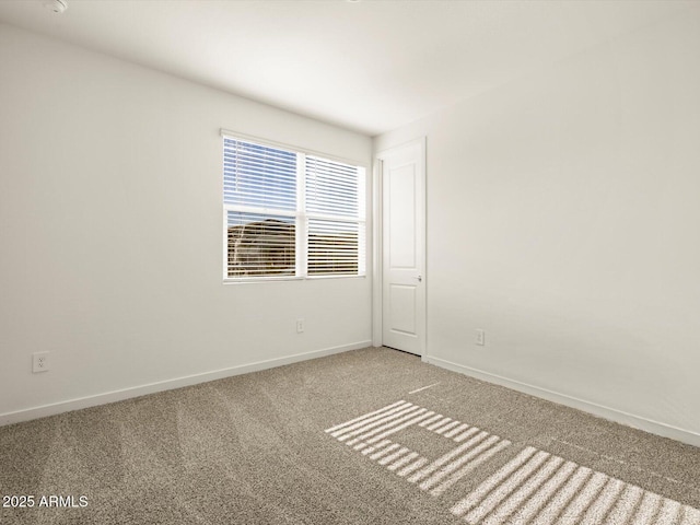 unfurnished room featuring carpet floors