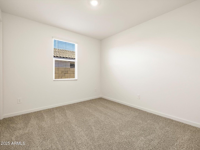 unfurnished room featuring carpet flooring