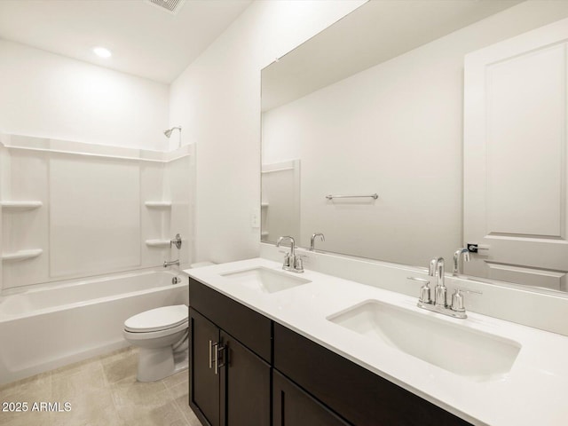 full bathroom with toilet, vanity, tile patterned floors, and shower / tub combination