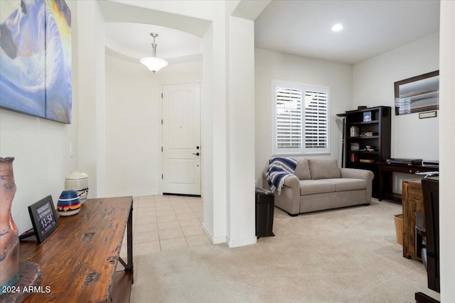 entryway with light carpet