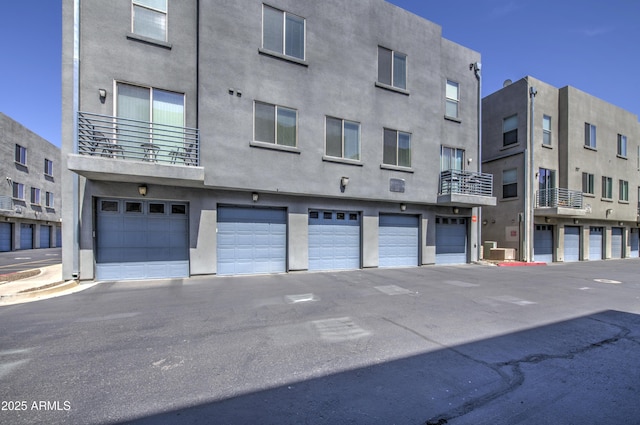 615 E Portland St Unit 261, Phoenix, AZ 85004 - view of building exterior featuring an attached garage