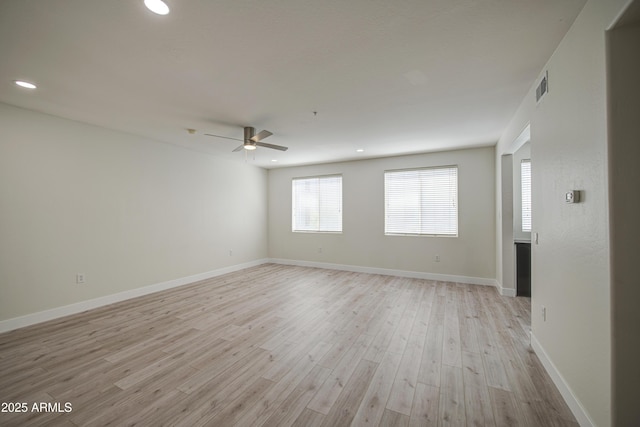 615 E Portland St Unit 261, Phoenix, AZ 85004 - spare room featuring a ceiling fan, light wood-style flooring, and recessed lighting