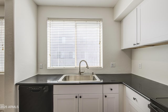 615 E Portland St Unit 261, Phoenix, AZ 85004 - kitchen with black appliances, dark countertops, and white cabinetry