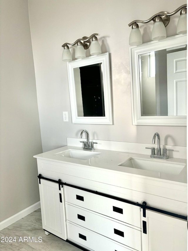 bathroom with hardwood / wood-style floors and vanity