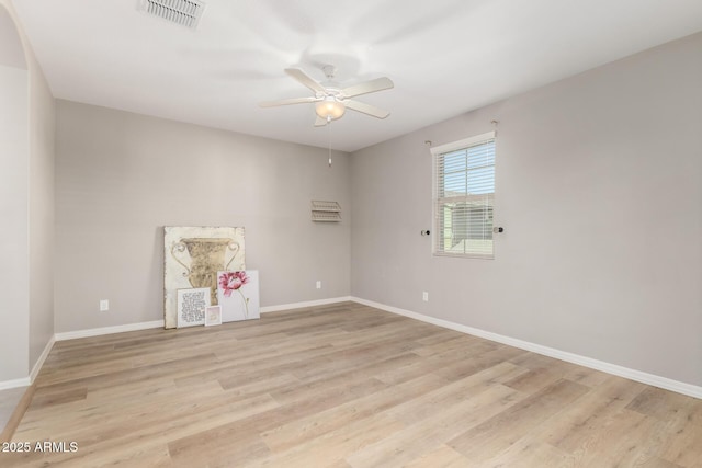 3910 E Turley St, Gilbert, AZ 85295 - unfurnished room with ceiling fan, light wood finished floors, and baseboards