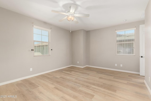 3910 E Turley St, Gilbert, AZ 85295 - unfurnished room featuring healthy amount of natural light, ceiling fan, light wood finished floors, and baseboards