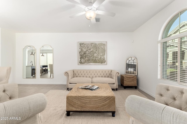 3910 E Turley St, Gilbert, AZ 85295 - living room featuring a ceiling fan, baseboards, and tile patterned flooring