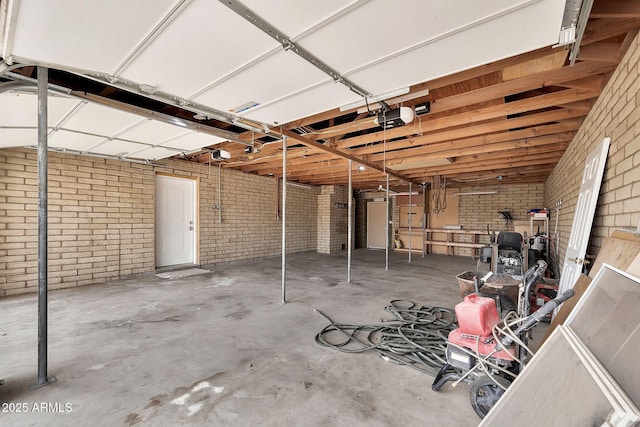 garage featuring a garage door opener