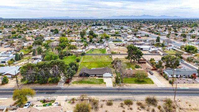 bird's eye view featuring a residential view and a mountain view