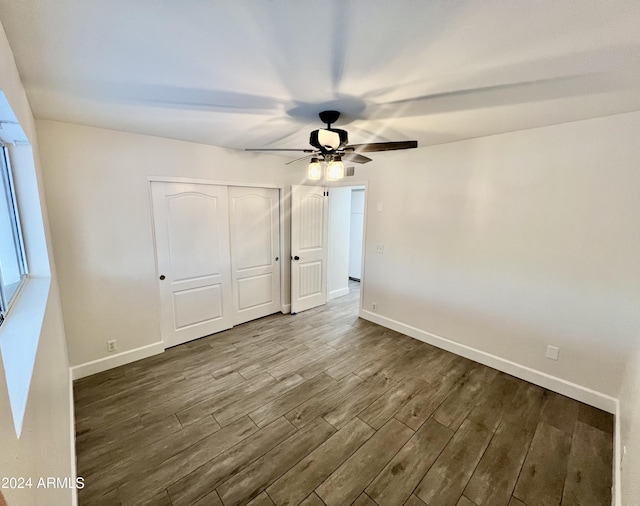 1737 N Trevor Dr, Mesa, AZ 85201 - unfurnished bedroom featuring wood finished floors, baseboards, and a closet