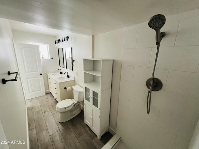 1737 N Trevor Dr, Mesa, AZ 85201 - full bath with wood finished floors, vanity, toilet, and a tile shower