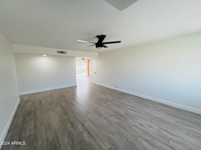 unfurnished room featuring ceiling fan and light hardwood / wood-style floors