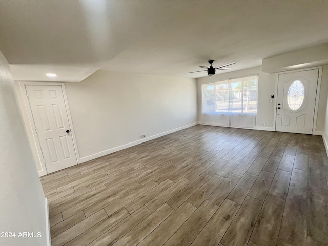 1737 N Trevor Dr, Mesa, AZ 85201 - foyer featuring wood finished floors, a ceiling fan, and baseboards